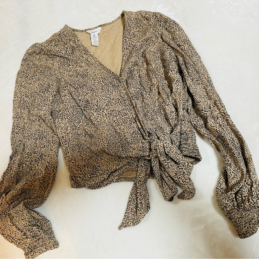 Women’s animal print tie blouse